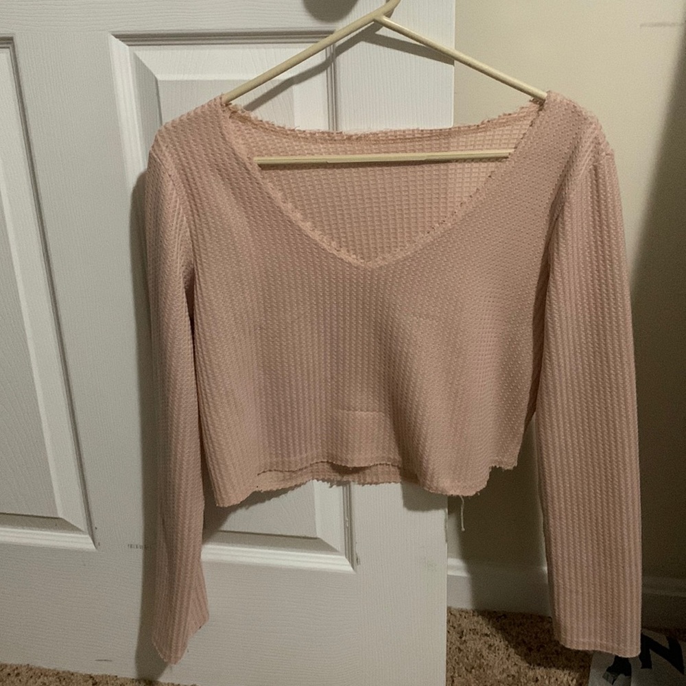 Cropped light sweater